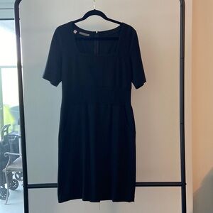 Black Dress. Never worn. Size 10. Thick elastic waist. Pockets! Very flattering.